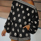 Bohemian jumpsuitset met schoudervrije pasvorm en print