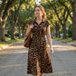 Elegante jurk met omgeslagen kraag en luipaardprint voor dames